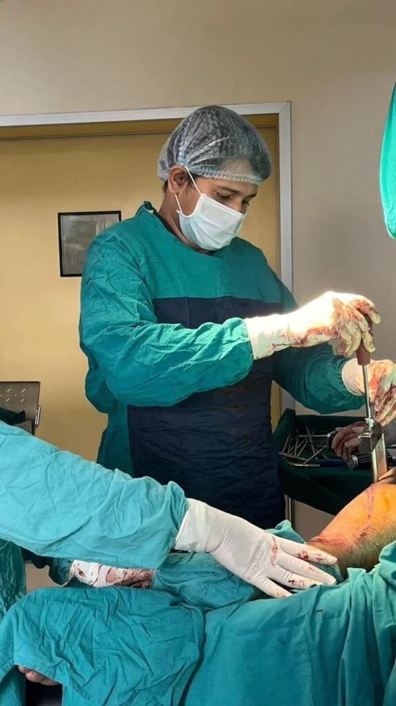 Dr. Abhishek Saxena performing orthopedic surgery